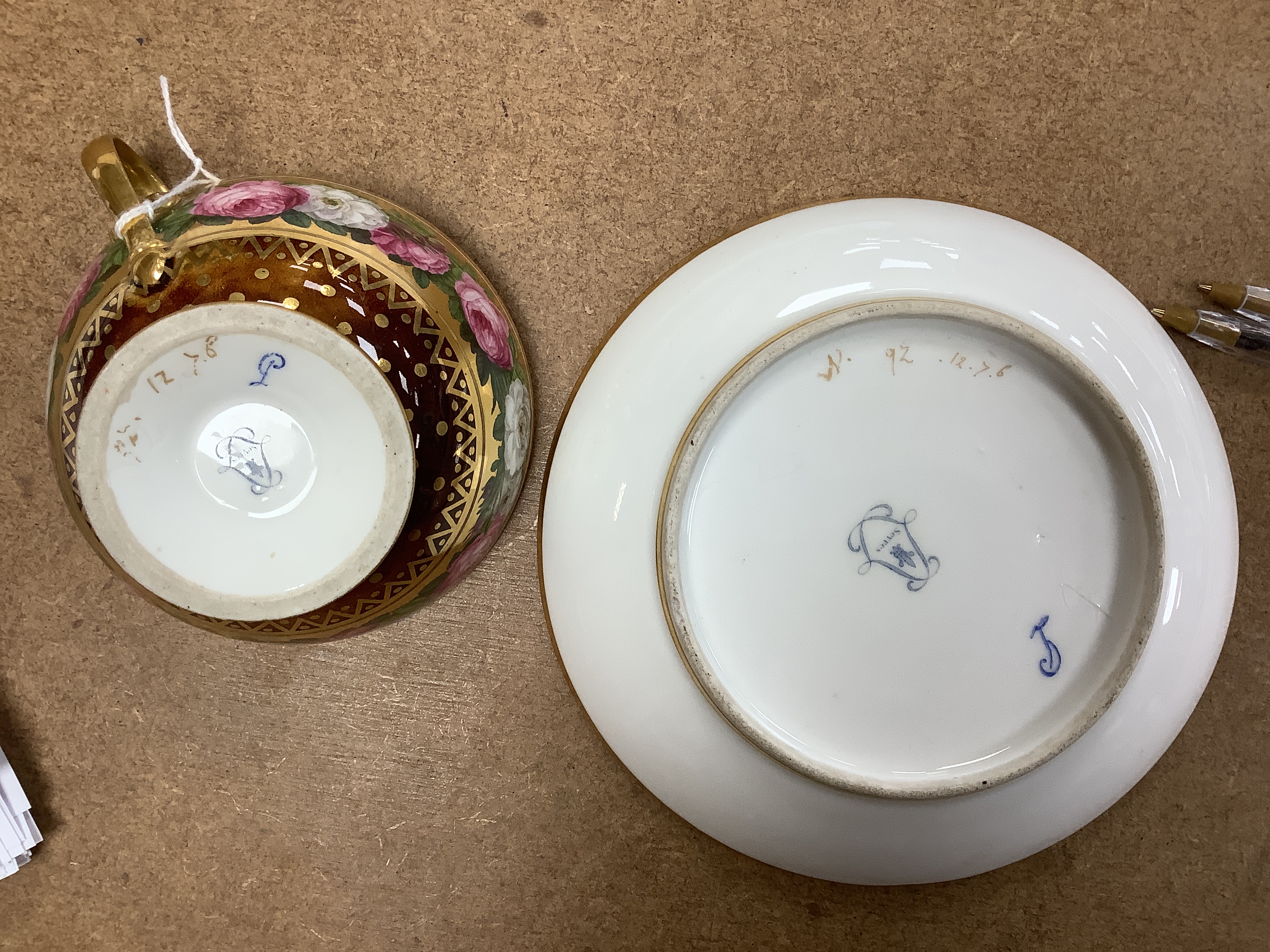 A 19th century Meissen cabinet cup and a Sevres teacup and saucer